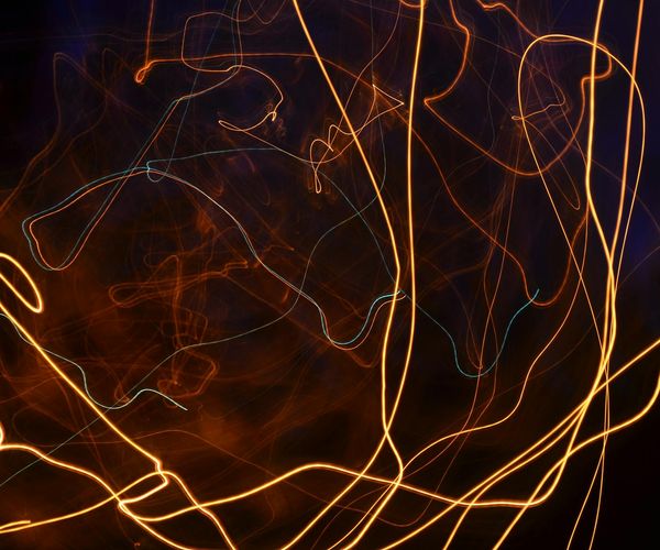 Abstract glowing lines representing muscular synergy